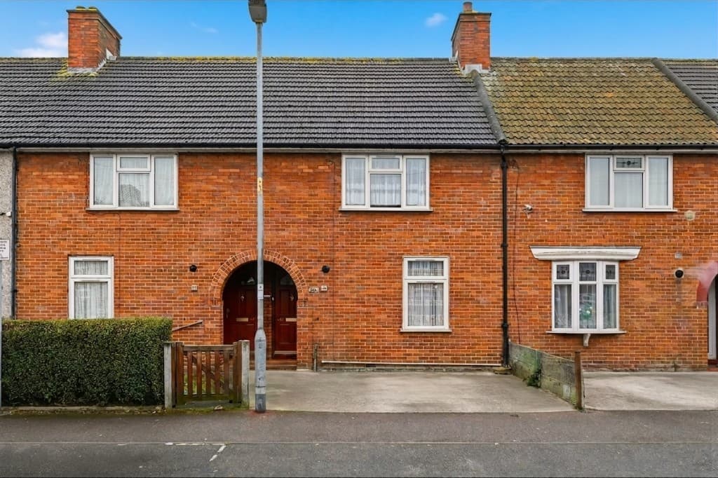 The same exterior with cars and wheelie bins removed by PhotoClear