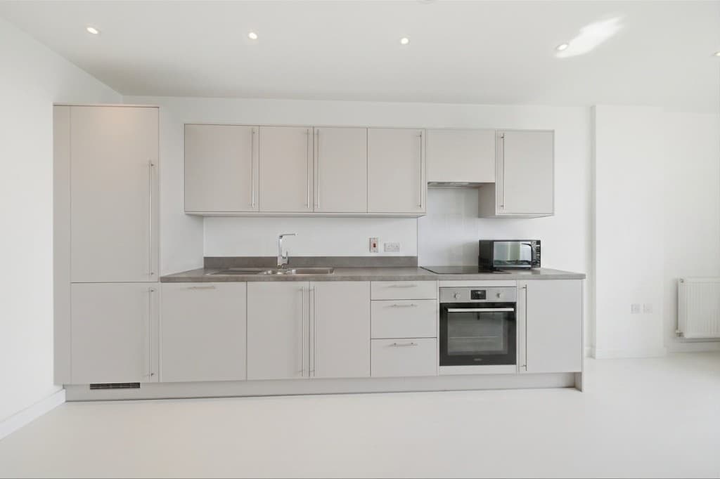 The same kitchen with worktops cleared and tidied by PhotoClear
